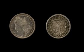 Two American Silver Dollars dated 1887 and 1896.