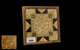 Pugin Style Encaustic Tile with floral design,