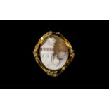 Victorian Oval Cameo Brooch, Depicting a Lady In a Village Street, In a Gilt Metal Frame.