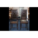 A Pair of French Gothic Revival Monks Chairs in stained beechwood with a profusely carved back of