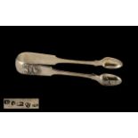 William IV - Rare Newcastle Pair of Solid Silver Sugar Nips with Shell Design.