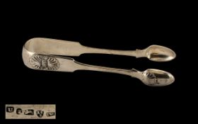 William IV - Rare Newcastle Pair of Solid Silver Sugar Nips with Shell Design.