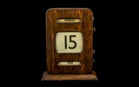 Edwardian Period - Early Scrolling Oak Cased Desk Top Perpetual Calendar with Day, Date and Month,