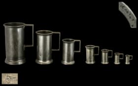 Set of Seven French Antique Pewter Measures from a centilitre to one litre;