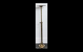 A Victorian Telescopic Brass Stand hexagonal support with circular base and top.