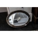 Art Deco Copper Framed Oval Shaped Mirror with Star Cut Center Traces of Chrome to the Frame,