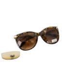 Dolce & Gabbana Pairof Sunglasses by Oscar de la Renta. 100% UV protection, with case.