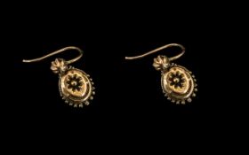 Victorian Gold Drop Earrings. Antique drop earrings set with rubies. See images.