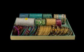 A Collection of Approx 300 Indian Dress Bangles multiple colours and beads.