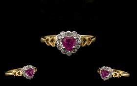 Ladies Ruby & Diamond Chip Ring in Heart Shape Setting, with heart shaped shanks. Ring size P.