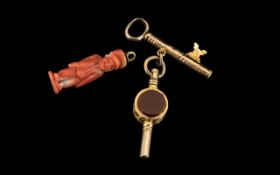 Two Victorian Novelty Watch Keys one in the form of a door key and the other set with blood stone