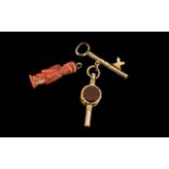 Two Victorian Novelty Watch Keys one in the form of a door key and the other set with blood stone