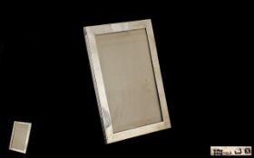 A Silver Photo Frame of Rectangular Shape From the 1920's. Wooden Back, Maker W.J.M & Co.