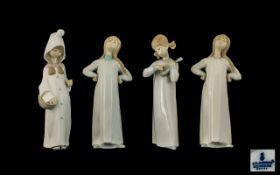 Lladro Hand Painted Porcelain Figures ( 4 ) In Total. All Featuring Young Girls In Night Dresses.