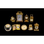 A Good Collection of Gold Gilt and Brass Miniature Clocks. Nine in total, various designs, sizes and
