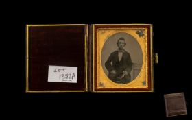 Early Plate Glass Photograph of a Young Gentleman wearing a large bow tie; a man of fashion,