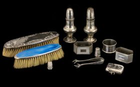 Good Collection of Hallmarked Silver comprising two clothes brushes, a salt and pepper set, pair