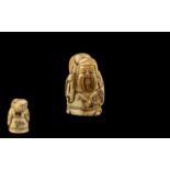 Ivory / Bone Netsuke Carved Figure Group of Man Holding Sack. Signed to Base, Please See Photo.