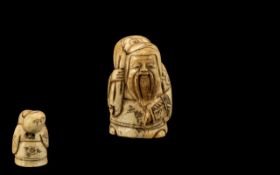 Ivory / Bone Netsuke Carved Figure Group of Man Holding Sack. Signed to Base, Please See Photo.