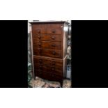 Large Victorian Mahogany Chest with graduated drawers and turned wooden knobs,