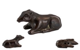 Antique Wood Japanese Netsuke of fine patination, depicting a reclining horse. Unsigned. Measures