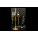 A Three Branch Brass Candle Lamp in the form of a Victorian Oil Lamp, of decorative form,