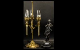 A Three Branch Brass Candle Lamp in the form of a Victorian Oil Lamp, of decorative form,