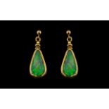 A Pair of 9ct Gold Opal Drop Earrings of triangular form. The opals approximately 14 by 7mm.
