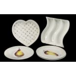 A Small Collection of Pottery to include three Limoges pear plates and two white pottery dishes