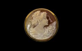 A Signed Round Shaped 9ct Gold Mounted Shell Cameo, Depicting a Young Woman Holding Flowers.
