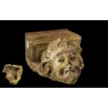 A Life Sized Unglazed Stoneware Finely Sculpted Angelic Cherubs Head Corbel Bracket,