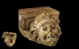 A Life Sized Unglazed Stoneware Finely Sculpted Angelic Cherubs Head Corbel Bracket,