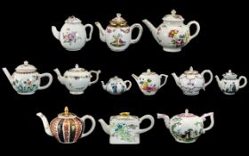 A Group of 12 Miniature Teapots After The Antique, Issued by Hochst for Franklin Mint.