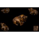 A Japanese Carved Boxwood Netsuke In The Form of a Wild Boar, Excellent Condition In All Aspects.