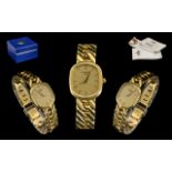A Ladies 18ct Gold Tissot Wristwatch gilt dial with baton numerals, quartz movement. Length 7.