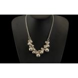 A Modern Fancy Silver Bauble Necklace. Length 16 inches. Weight 52 grams.