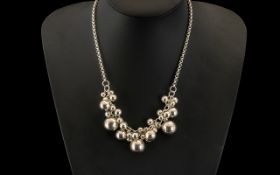 A Modern Fancy Silver Bauble Necklace. Length 16 inches. Weight 52 grams.