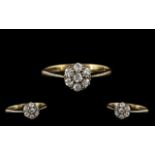 18ct Gold Attractive 7 Stone Diamond Set Cluster Ring In a Flower head Setting.