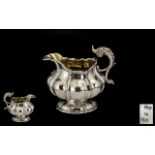 George IIII - Ornate Silver Cream Jug of Pleasing Form and Design. Hallmark London 1829.