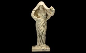 A Modern Decorative Resin Centrepiece in the form of a classical semi-nude.