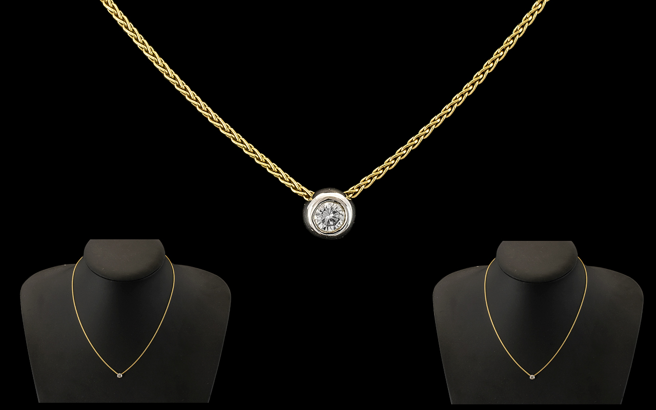 18ct Gold Diamond Pendant, diamond of good colour and sparkle, suspended on an 18ct gold chain.