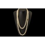 Long 1930's Faux Pearl Necklace. Length 60 Inches.