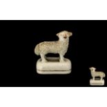 Antique Miniature Staffordshire Figure of a Lamb, with a fritted coat, on a base; 1.