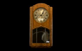 Art Deco German Walnut Wall Clock, c1930s, by Hermle; three hole wind with chime rods,