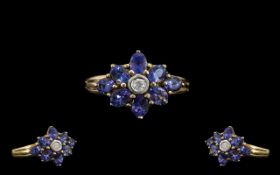 Ladies 9ct Gold - Attractive Topaz and Diamond Set Cluster Ring, Flower head Design.