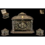 Victorian Sarcophagus Shape Silvered Metal Lidded Tea Caddy with embossed floral decoration and