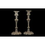 Pair of Silver Plate Rococo Style Candlesticks. Measuring 9.5 Inches In Height. Please See Image.