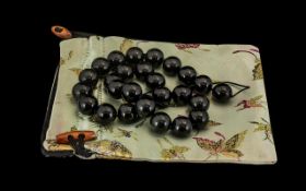 A Black Nephrite Jade Beaded Necklace Beautiful set of black jade nephrite beads from Western China,