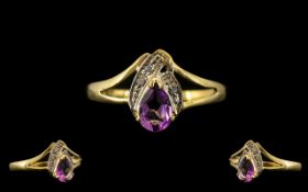 9ct Gold Amethyst and Diamond Set Ring, Set with Pear Shaped Amethyst, Flanked with Diamonds.