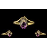 9ct Gold Amethyst and Diamond Set Ring, Set with Pear Shaped Amethyst, Flanked with Diamonds.